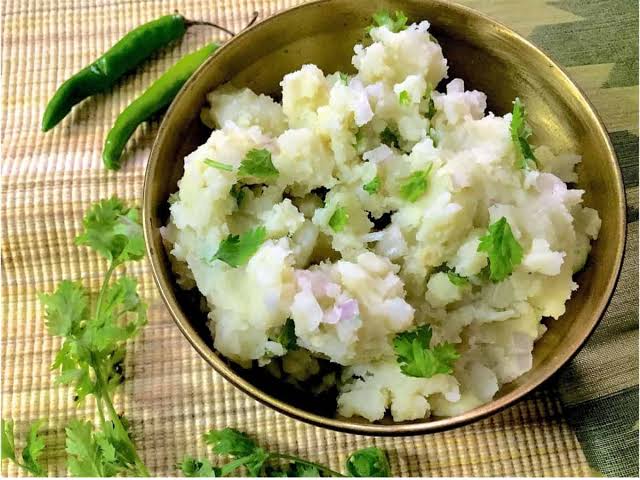 Pitika. Mashed, mustard oil, eaten first.
