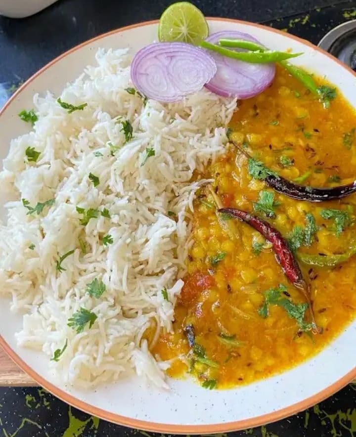 Rice and dal. The centre of the plate.